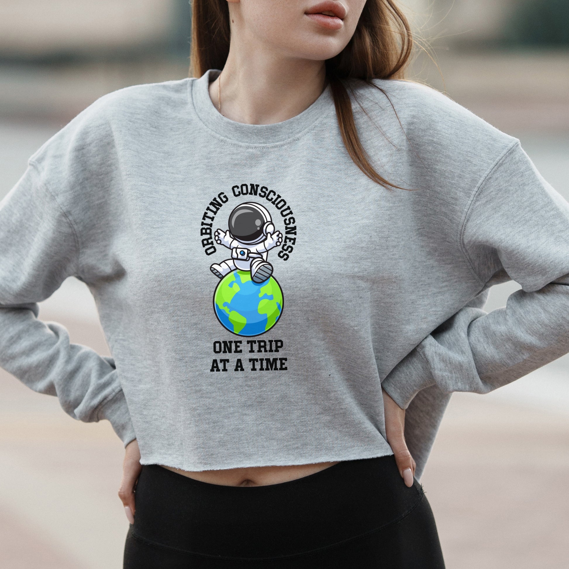 Orbiting Consciousness Astronaut Graphic with One Trip at a Time Text – Vintage Crop Sweatshirt