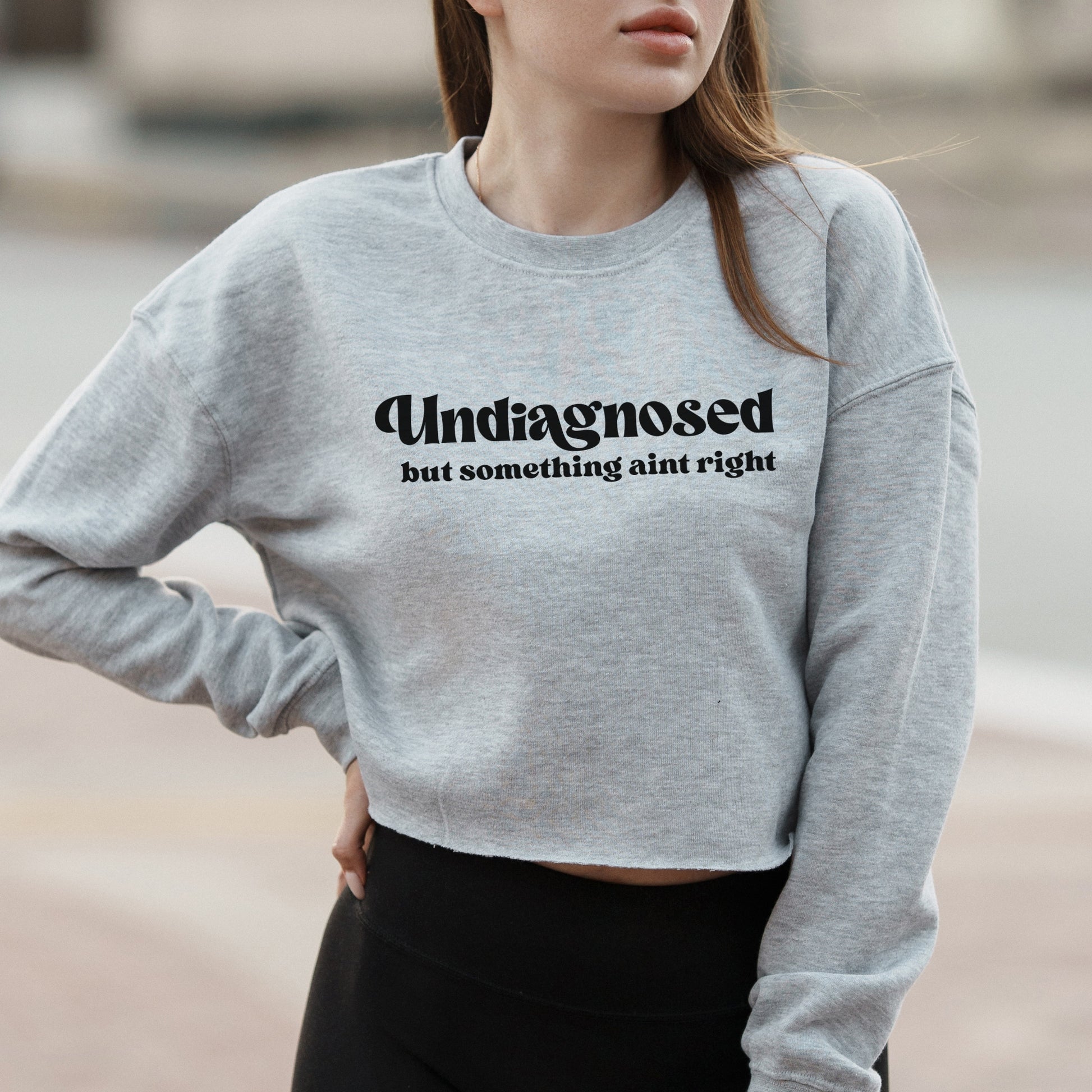 Undiagnosed But Something Ain’t Right Text Graphic with Sarcastic Humor – Vintage Crop Sweatshirt