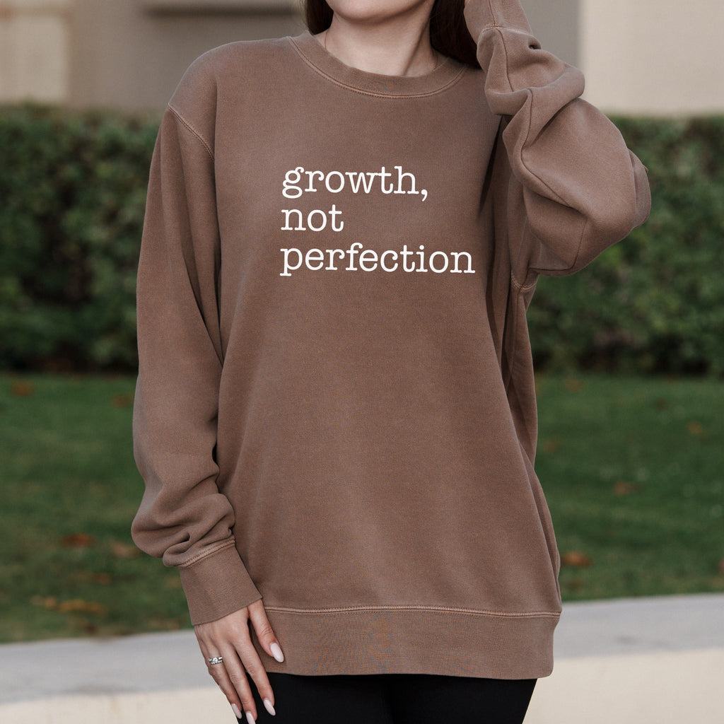 Growth Not Perfection Minimalist Text Graphic with Motivational Message – Pigment Crewneck Sweatshirt