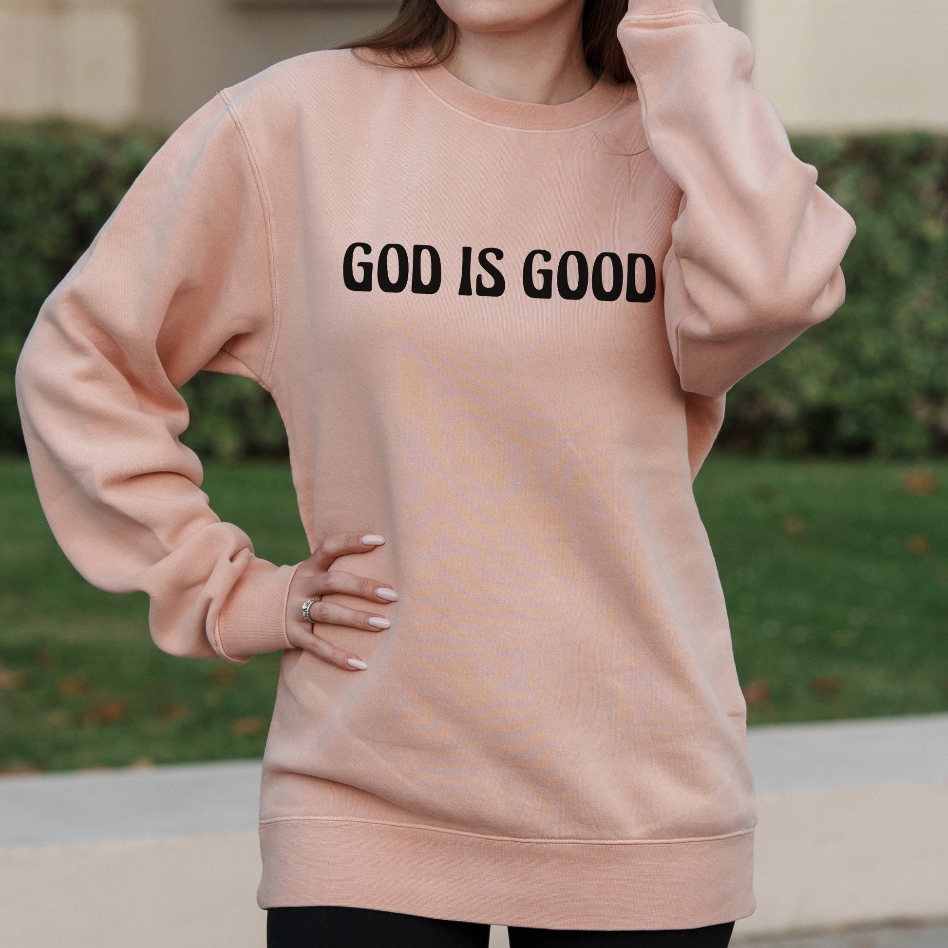 God Is Good Minimalist Text Graphic with Faith-Based Message – Pigment Crewneck Sweatshirt